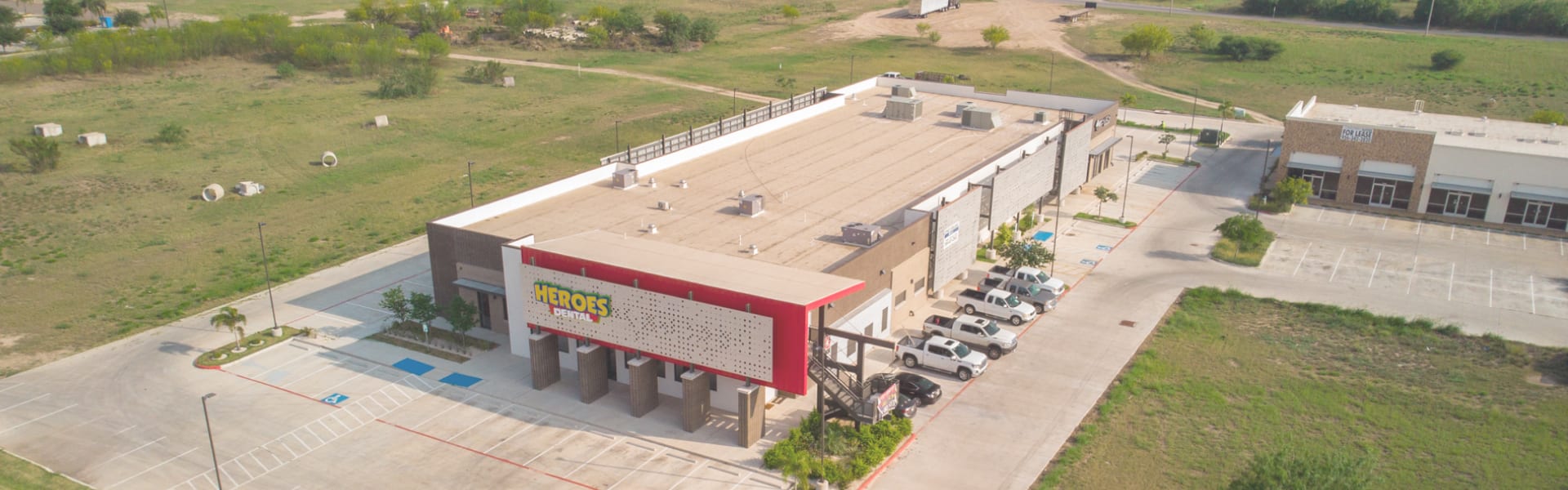 Aerial view of a commercial retail building completed by Guzman Construction in the Rio Grande Valley